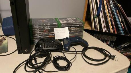 selling Xbox One X + games in great condition Calgary Only $375.00