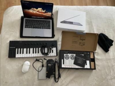MacBook Pro 13 Touch Bar + Accessories $1,900.00
