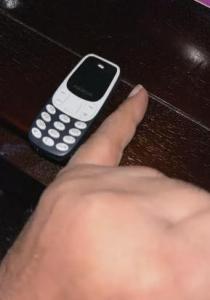 Cellphone miniature. Worlds smallest phone
