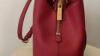 Beautiful magenta Michael Kors leather bag with gold trim